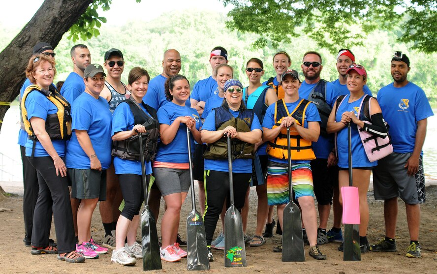 Members of the 111th Argonauts, a dragon boat team comprised of members and affiliates of the 111th Attack Wing at Horsham Air Guard Station, pose for a picture before the first race during the Independence Dragon Boat Regatta in Philadelphia, June 6, 2015. The team won three out of four races, earning the bronze medal. (U.S. Air National Guard photo by Tech.Sgt. Andria Allmond/Released)