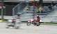 Mikayla Moore, professional mini motard racer, demonstrates maneuvers at the Fifth Annual Motorcycle Safety Day June 11, 2015, at Joint Base Andrews, Md. The safety day included various demonstrations to educate Team Andrews members about safe riding practices. (U.S. Air Force photo by Senior Airman Preston Webb/Released)
