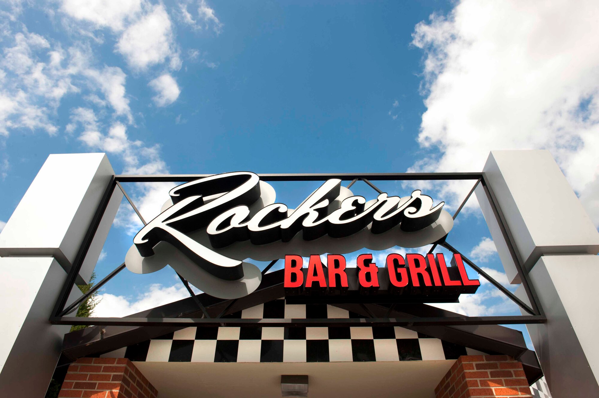 Rockers’ new sign stands at Minot Air Force Base, N.D., June 5, 2015. Rockers held a ribbon cutting ceremony in the parking lot to celebrate the grand re-opening of the base’s most recently renovated restaurant. (U.S. Air Force photo/Airman 1st Class Sahara L. Fales)
