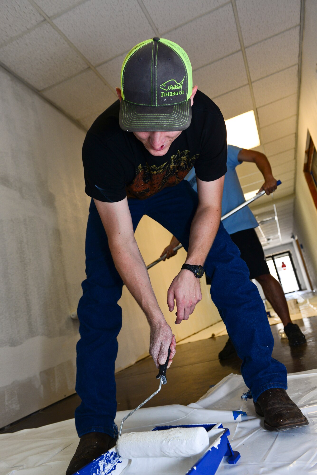 Airman 1st Class Derrick Bellomy, 2nd Operations Support Squadron air traffic controller, rolls paint onto a brush at the Global Power Museum on Barksdale Air Force Base, La., June 10, 2015. The museum is not only a memorial to the Air Force’s successes in battle, but a recognition of the many years spent training to deter war. (U.S. Air Force Photo/Airman 1st Class Luke Hill)