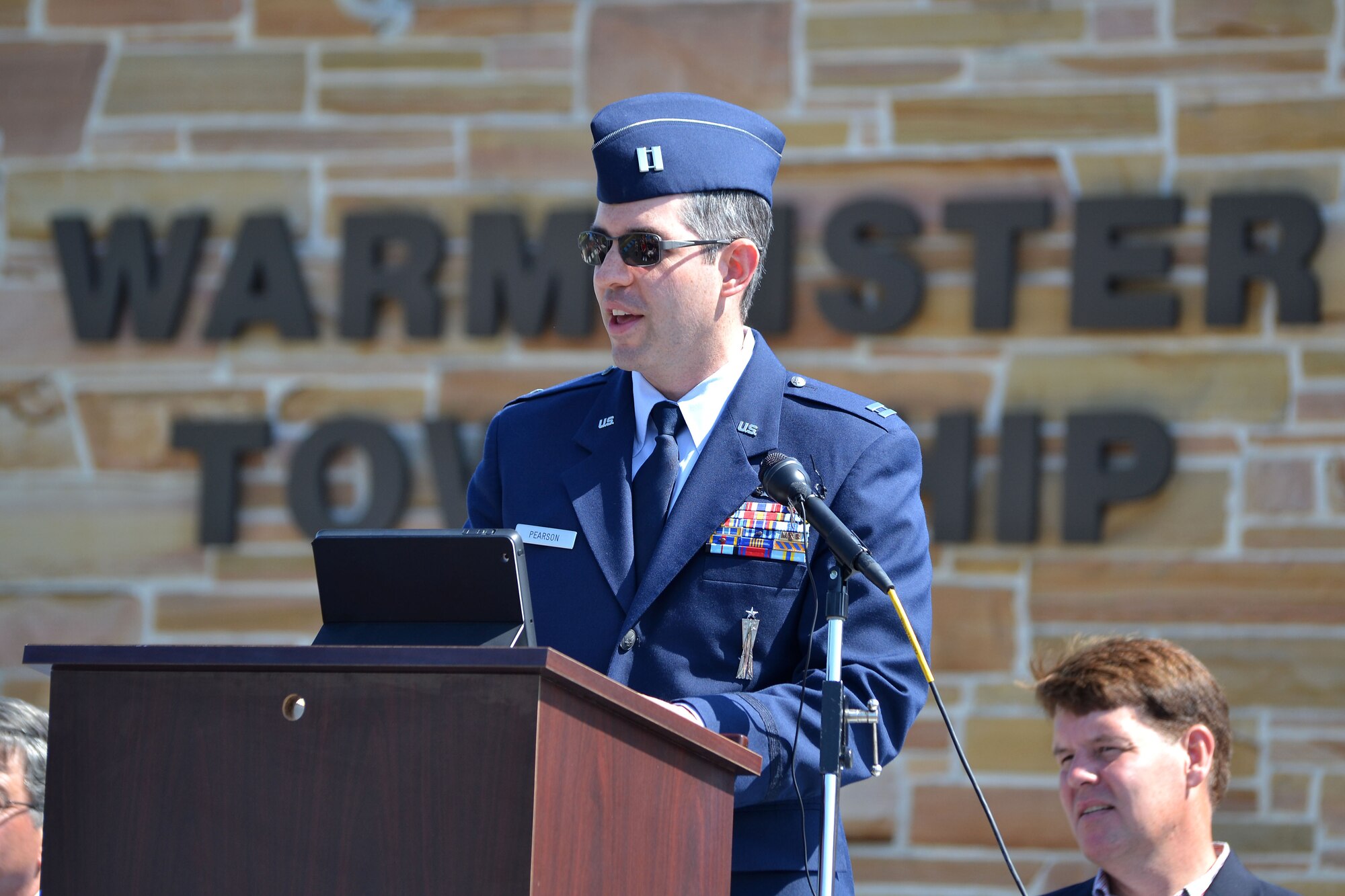 Capt. Sean Pearson, 111th Attack Wing chief of public affairs, Horsham Air Guard Station, Pennsylvania, closes as the keynote speaker during the Memorial Day celebration, May 25, 2015 in Warminster, Pennsylvania. Residents waited and watched in anticipation along the streets of the parade route during the day-long event. (U.S. Air National Guard photo by Master Sgt. Christopher Botzum/Released)