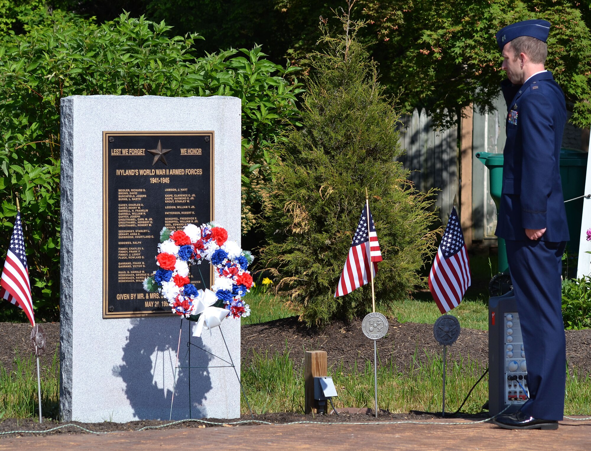 During a wreath laying ceremony in Ivyland, Pennsylvania, May 25, 2015, Capt. Timothy McManus, wing executive officer with the 111th Attack Wing at Horsham Air Guard Station, renders a salute to resident veterans of World War II as “Taps” is played in the background. (U.S. Air National Guard photo by Master Sgt. Christopher Botzum/Released)