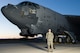 Tech. Sgt. Suann Becton, 507th Maintenance Squadron poses in front of B-52 aircraft number 61-007 which she helped bring back from the Boneyard in both civilian and Air Force Reserve status. The B-52 dubbed the Ghost Rider flew from Davis-Monthan Air Force Base, Ariz., back to Barksdale Air Force Base, La., after the maintenance team brought it back to life. (Courtesy photo/Released)