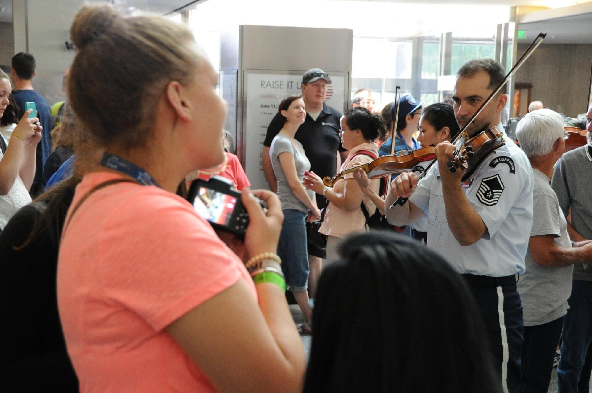 The Air Force Strings performs for an audience at the National Museum of American History in Washington, D.C., June 11, 2015. The United States Air Force Band will perform free concerts weekly at several venues in the National Capitol Region throughout the summer. For the complete list of summer concerts, please visit: http://www.usafband.af.mil/event/summerconcerts.asp.(U.S. Air Force photo/ Staff Sergeant Matt Davis)