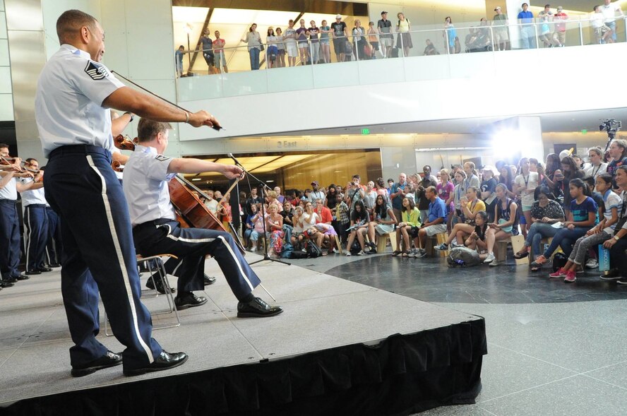 The Air Force Strings performs for an audience at the National Museum of American History in Washington, D.C., June 11, 2015. The United States Air Force Band will perform free concerts weekly at several venues in the National Capitol Region throughout the summer. For the complete list of summer concerts, please visit: http://www.usafband.af.mil/event/summerconcerts.asp.(U.S. Air Force photo/ Staff Sergeant Matt Davis)
