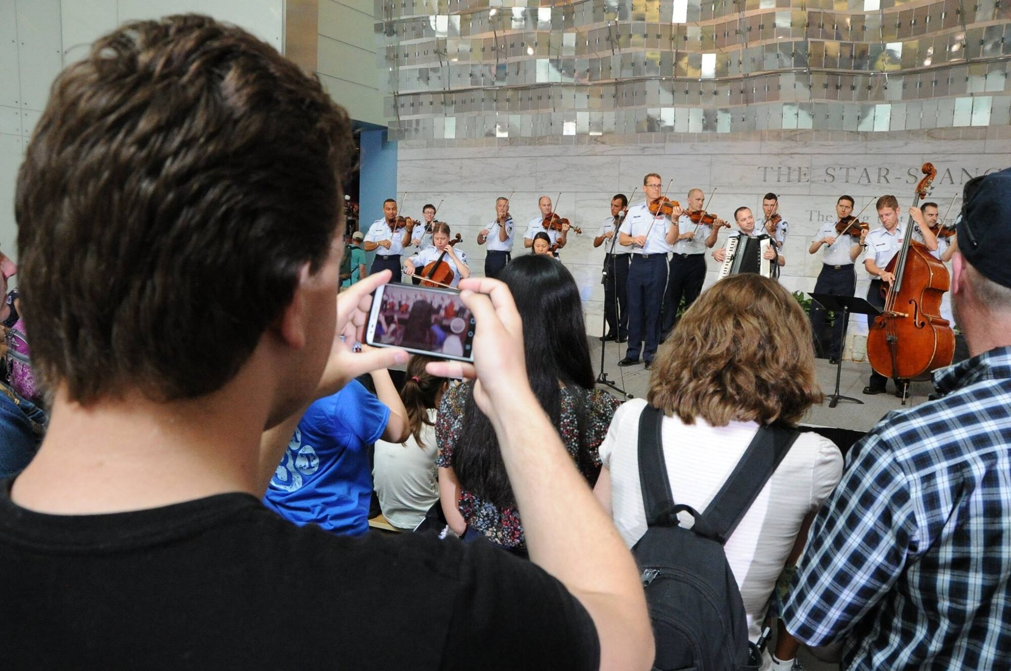 The Air Force Strings performs for an audience at the National Museum of American History in Washington, D.C., June 11, 2015. The United States Air Force Band will perform free concerts weekly at several venues in the National Capitol Region throughout the summer. For the complete list of summer concerts, please visit: http://www.usafband.af.mil/event/summerconcerts.asp.(U.S. Air Force photo/ Staff Sergeant Matt Davis)