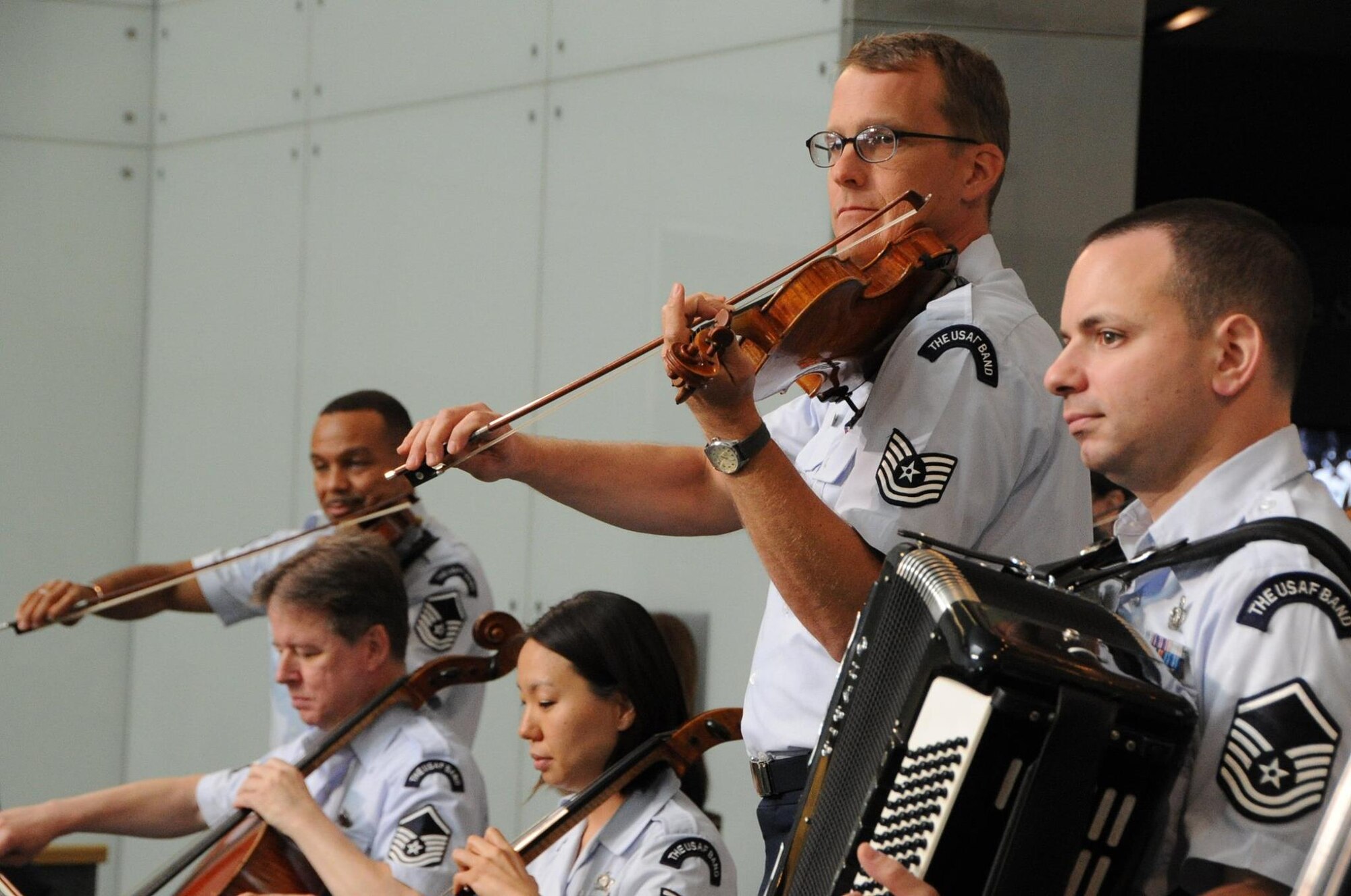 The Air Force Strings performs for an audience at the National Museum of American History in Washington, D.C., June 11, 2015. The United States Air Force Band will perform free concerts weekly at several venues in the National Capitol Region throughout the summer. For the complete list of summer concerts, please visit: http://www.usafband.af.mil/event/summerconcerts.asp.(U.S. Air Force photo/ Staff Sergeant Matt Davis)