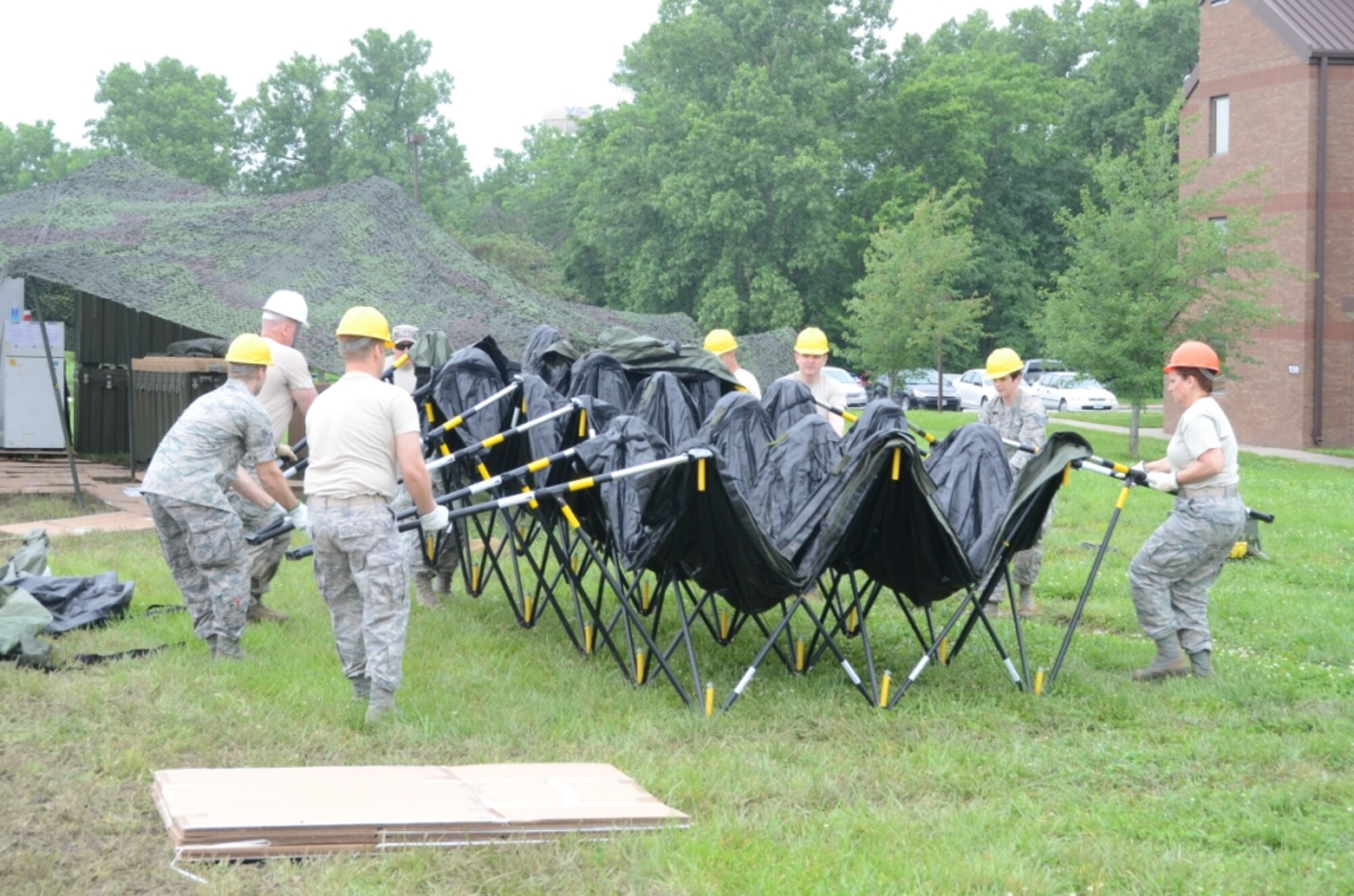 Citizen-Airmen of the 131st Bomb Wing train for state emergency response by setting up a tent shelter at Whiteman Air Force Base, Missouri, June 6, 2015.  Since 2009, the Missouri National Guard has mobilized almost 6,000 Citizen-Airmen and Citizen-Soldiers for 15 state missions.