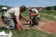 Air Force Master Sgts. Jacob Erpenbach and Chip Carda with the South Dakota Air National Guard’s 114th Civil Engineer Squadron in Sioux Falls, S.D., construct sidewalks across the parade field on Camp Rapid in Rapid City, S.D., June 9, 2015. The project is part of the squadron’s training for the Golden Coyote exercise.(Army National Guard photo by PFC Kristin Lichius/Released)