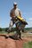 Airman 1st Class Michael Hartog with the South Dakota Air National Guard’s 114th Civil Engineer Squadron of Sioux Falls, S.D., operates a compressor while constructing sidewalks across the parade field on Camp Rapid in Rapid City, S.D., June 9, 2015. The project is part of the squadron’s training for the Golden Coyote exercise.(Army National Guard photo by PFC Kristin Lichius/Released)