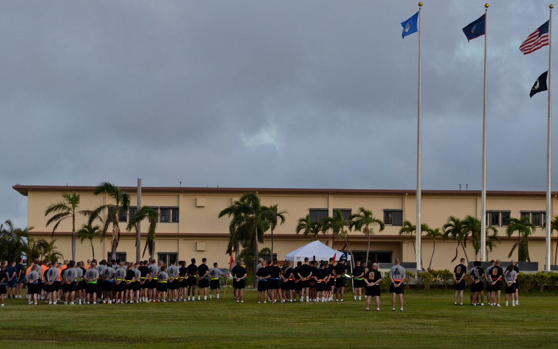 Soldiers from Task Force Talon stand in formation before they start their 3-mile esprit de corps run June 12, 2015, at Andersen Air Force Base, Guam.  The event was held in honor of the Army’s 240th Birthday. (U.S. Air Force photo by Airman 1st Class Alexa Ann Henderson/Released)