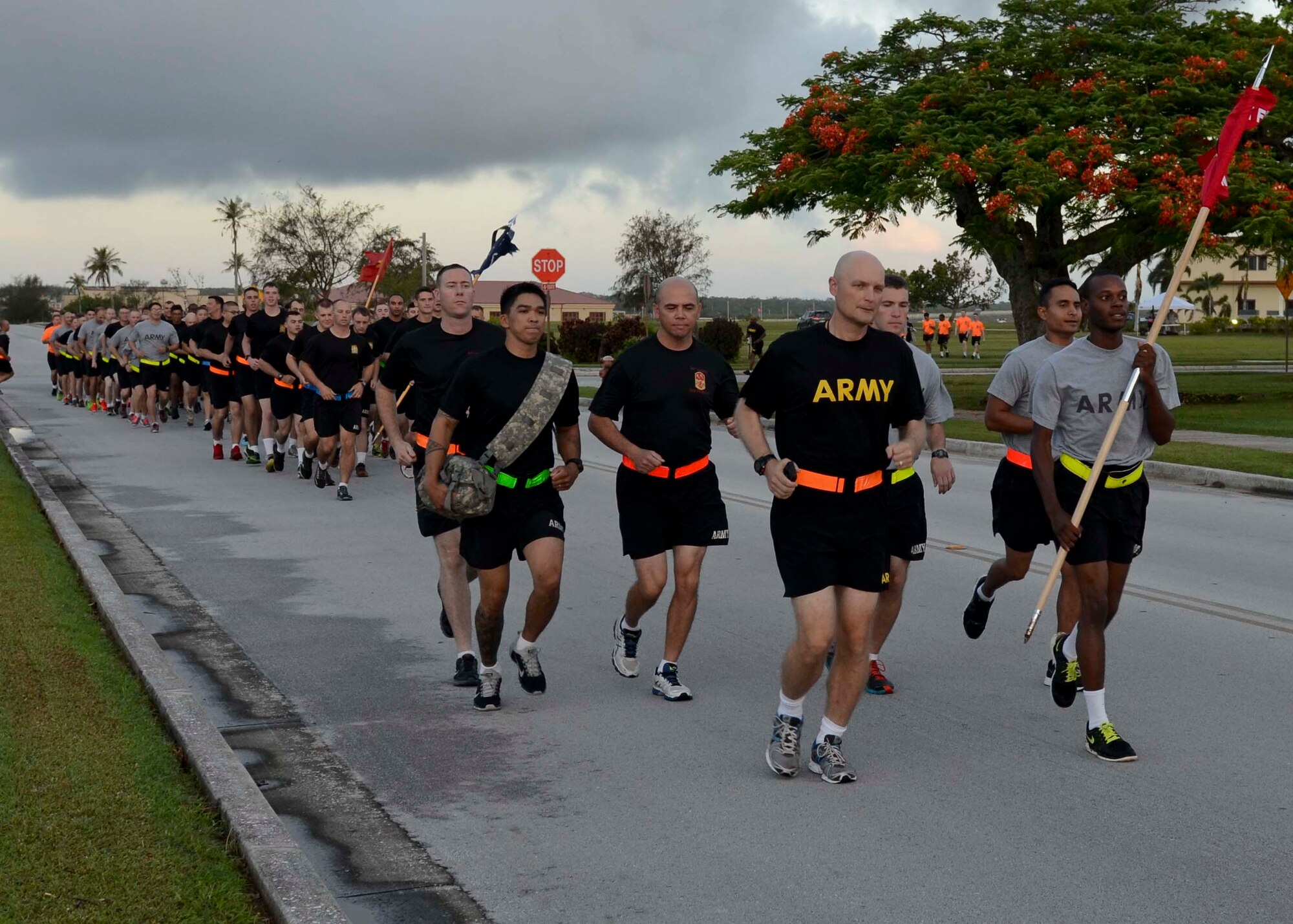 Soldiers from Task Force Talon participate in an esprit de corps run June 12, 2015, at Andersen Air Force Base, Guam.  The event was held in honor of the Army’s 240th Birthday. (U.S. Air Force photo by Airman 1st Class Alexa Ann Henderson/Released)