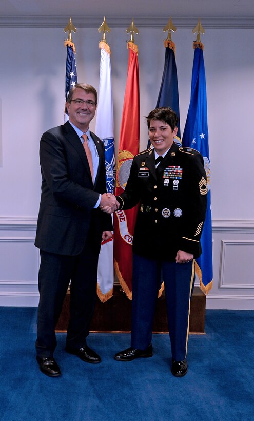 Defense Secretary Ash Carter Army Master Sgt. Kimberly L. Baker, the Office of the Secretary of Defense's senior enlisted service member of the year, pose for a photograph at the Pentagon, June 12, 2015.