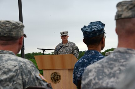 U.S. Army Lt. Col. Brian Witcher, U.S. Strategic Command's Army element deputy commander, speaks during the streamer recognition ceremony as part of USSTRATCOM's celebration of the 240th Army Birthday at USSTRATCOM headquarters, Offutt Air Force Base, Neb., June 12, 2015. The birthday, which falls on June 14, marks "240 Years of Selfless Service to the Nation" and USSTRATCOM's celebration honored the 115 all-volunteer soldiers and their families assigned to the command. USSTRATCOM is one of nine DoD unified combatant commands and is charged with strategic deterrence; space operations; cyberspace operations; joint electronic warfare; global strike; missile defense; intelligence, surveillance and reconnaissance; combating weapons of mass destruction; and analysis and targeting. (U.S. Navy photo by Mass Communication Specialist 1st Class Byron C. Linder/Released)