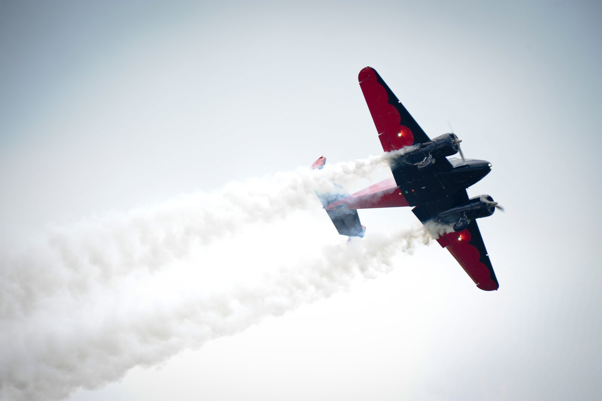 A Beechcraft Model 18 flies during the Wings Over Whiteman air show June 13, 2015, at Whiteman Air Force Base, Mo. In addition to the aerial acts, attendees were also treated to military static displays including the C-5 Galaxy, T-38 Talon and B-52 Stratofortress. (U.S. Air Force photo by Staff Sgt. Brigitte N. Brantley/Released)