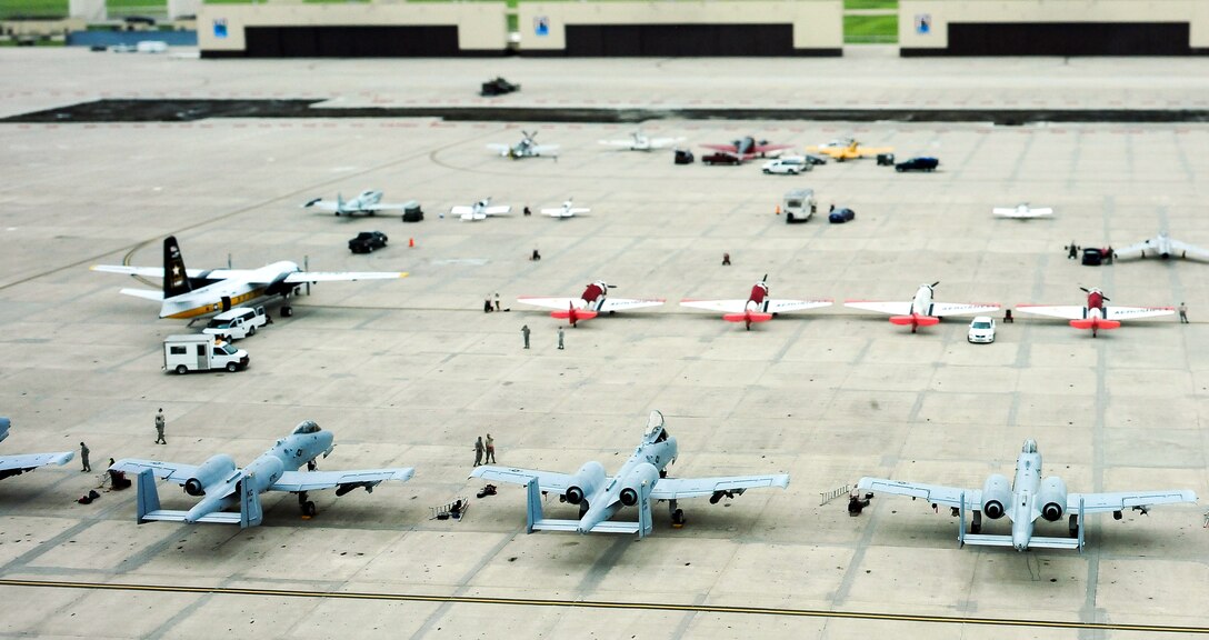 Aircraft sit on the flightline June 13, 2015, during the Wings Over Whiteman air show at Whiteman Air Force Base, Mo. Although aircraft from around the country participate, WOW is especially an opportunity for the base to show off the B-2 Spirit stealth bomber and A-10 Thunderbolt.(U.S. Air Force photo by Staff Sgt. Brigitte N. Brantley/Released)