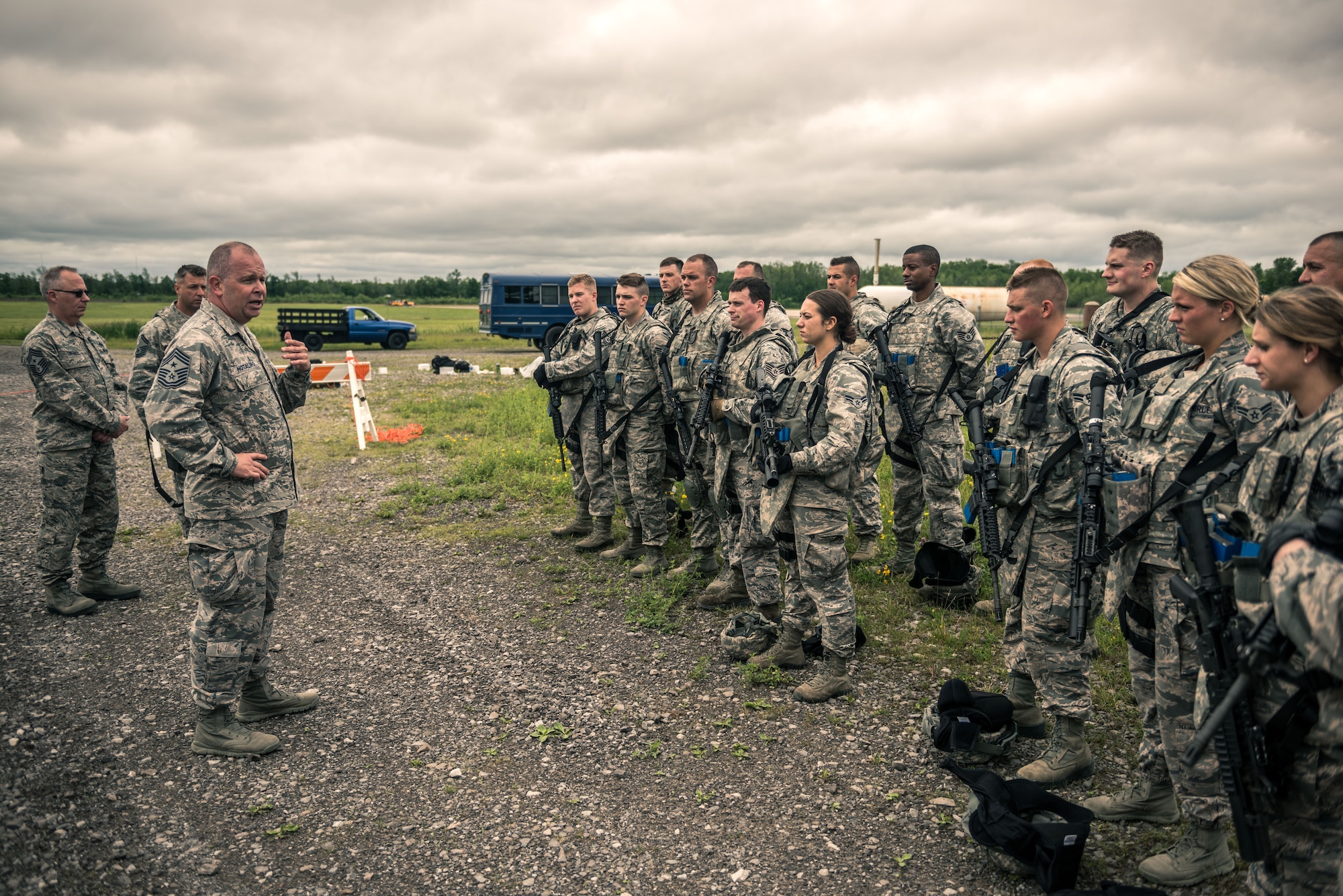 Chief Master Sgt. James W. Hotaling, Command Chief Master Sergeant of the Air National Guard, addresses members of the 107th AW Security Forces after participating in a “shoot and move” exercise in response to a Chief’s Challenge at Niagara Falls Air Reserve Station on June 13, 2015. (U.S. Air National Guard photo/Staff Sgt. Ryan Campbell)