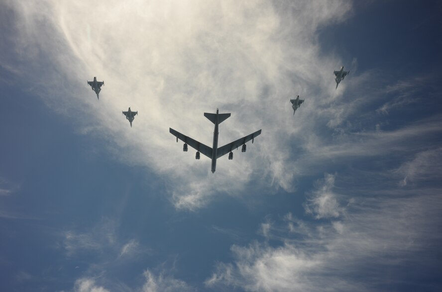 A U.S. Air Force B-52H Stratofortress leads a flight of four Swedish JAS-39 Gripens June 11, 2015, during a BALTOPS 2015 mission over the Baltic Sea. The aircraft took part in multiple missions throughout the exercise, including MK-62 Quick Strike mine drops and naval support functions. During this part of the exercise, the two airframes practiced aircraft intercepts and formation flights to hone skills between pilots from different countries. (Swedish Armed Forces courtesy photo)