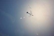 A U.S. Air Force B-52H Stratofortress leads a flight of four Swedish JAS-39 Gripens June 11, 2015, during a BALTOPS 2015 mission over the Baltic Sea. The aircraft took part in multiple missions throughout the exercise, including MK-62 Quick Strike mine drops and naval support functions. During this part of the exercise, the two airframes practiced aircraft intercepts and formation flights to hone skills between pilots from different countries. (Swedish Armed Forces courtesy photo)