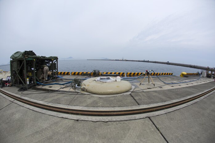 Electricians, electrician mechanics and water technicians with Marine Wing Support Squadron 171 conducted their quarterly Readiness Training Program at the Iwakuni Harbor aboard Marine Corps Air Station Iwakuni, Japan, June 9-11, 2015. The mission of this the training was to purify 6,000 gallons of water. The three-day long training began with the moving of the equipment to the harbor, then executing the mission and ended with the tearing down of their setup and reviewing their work. The training also aided in giving Marines the opportunity to gain more understanding with the use of the equipment and building camaraderie.