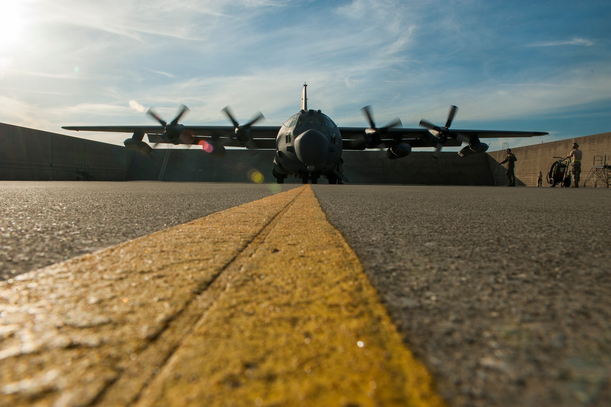 A U.S. Air Force MC-130H Combat Talon II from the 1st Special Operations Squadron starts engines for takeoff on the Kadena Air Base, Japan, flightline May 14, 2015.  The 1st Special Operations Squadron is one of five squadrons that make up the 353rd Special Operations Group.  As the only Air Force special operations group in the Pacific, they are the focal point for Air Force special operations activities throughout the United States Pacific Command Theater.  (U.S. Air Force photo by Senior Airman Stephen G. Eigel)