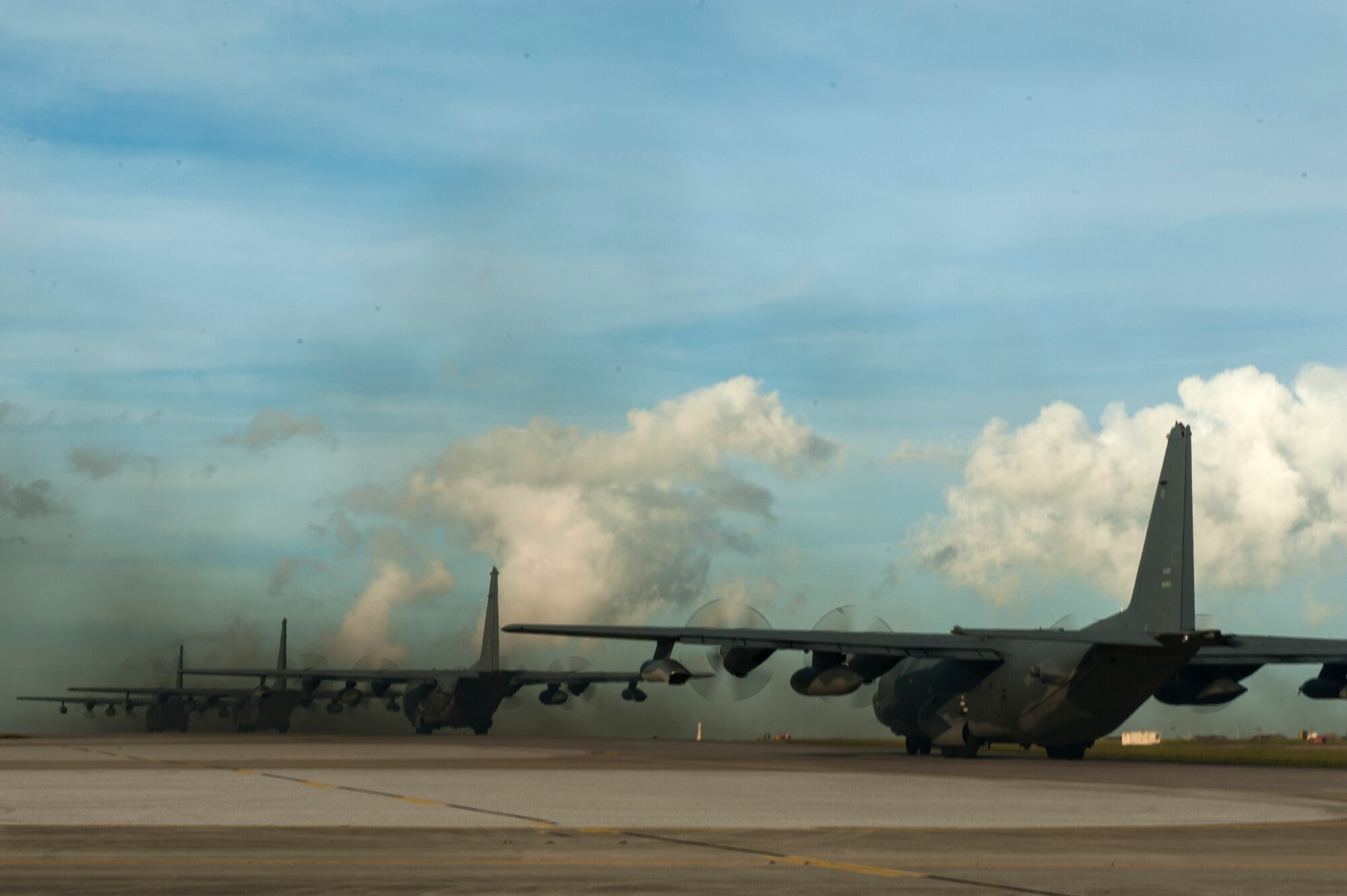 Four U.S. Air Force MC-130H Combat Talon IIs from the 1st Special Operations Squadron taxi in line on the Kadena Air Base, Japan, flightline May 14, 2015.  The 1st Special Operations Squadron operates the MC-130H providing infiltration, exfiltration, and resupply of special operations forces and equipment in hostile or denied territory.  By conducting formation flight, aircrews and maintainers test and validate their ability to efficiently generate aircraft and to quickly infiltrate and exfiltrate large numbers of ground forces.  (U.S. Air Force photo by Senior Airman Stephen G. Eigel)