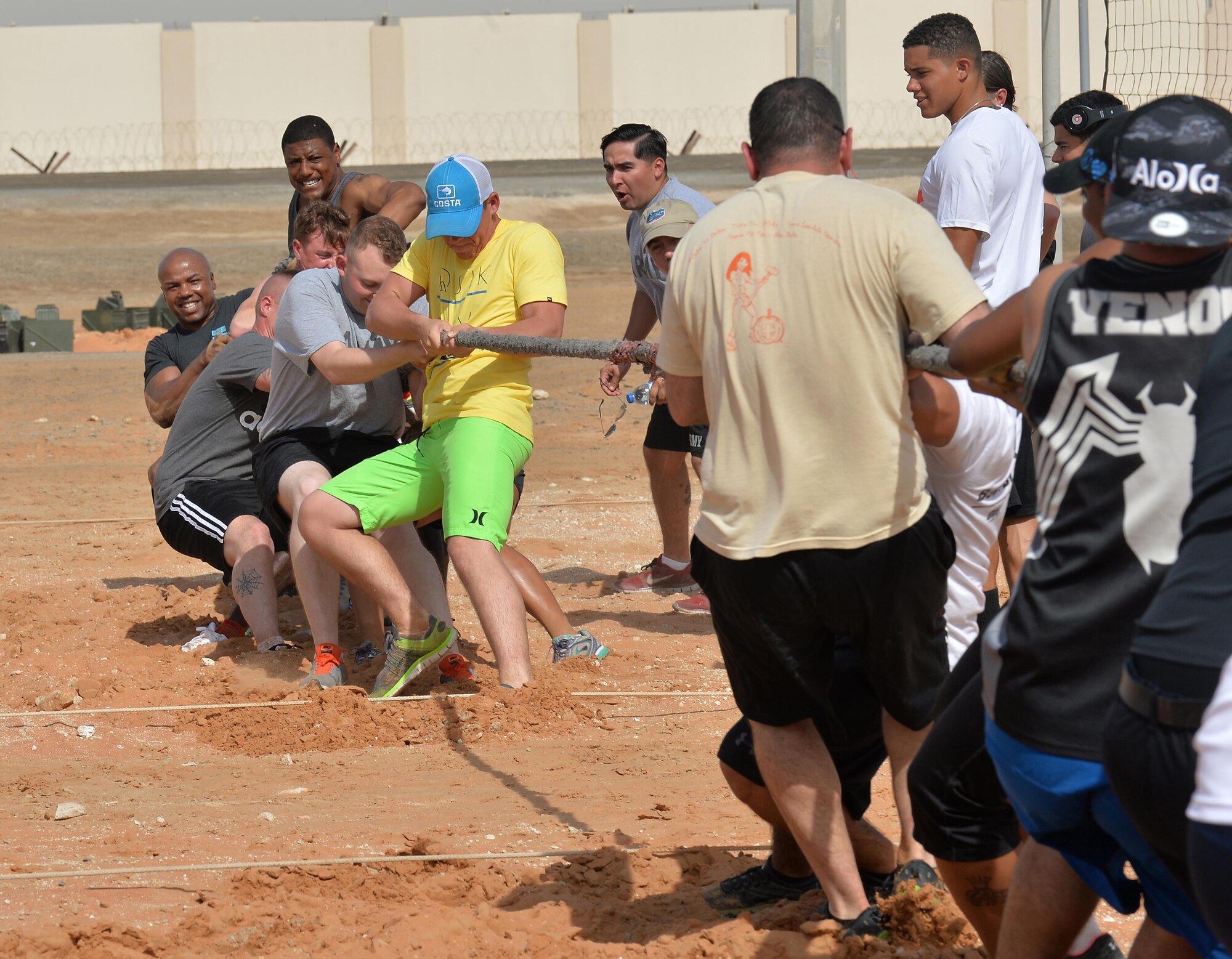 Tug-o-war teams go head-to-head during a tournament at an undisclosed location in Southwest Asia June 13, 2015. The teams, who were made up of U.S. Soldiers and Airmen as well as other coalition forces, participated in five sports, including this one, to help celebrate the U.S. Army’s 240th birthday. (U.S. Air Force photo/Tech. Sgt. Jeff Andrejcik) 