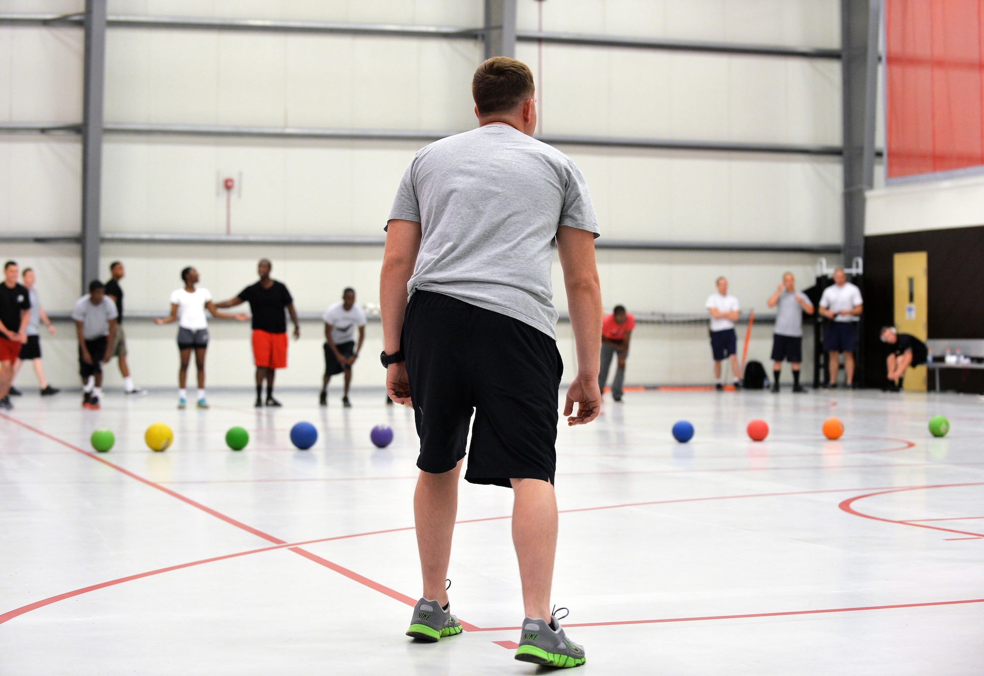 Two teams prepare to make a dash for dodgeballs at an undisclosed location in Southwest Asia June 13, 2015. The dodgeball tournament was one of the five sports played during a two-day span to celebrate the U.S. Army’s 240th birthday. (U.S. Air Force photo/Tech. Sgt. Jeff Andrejcik)