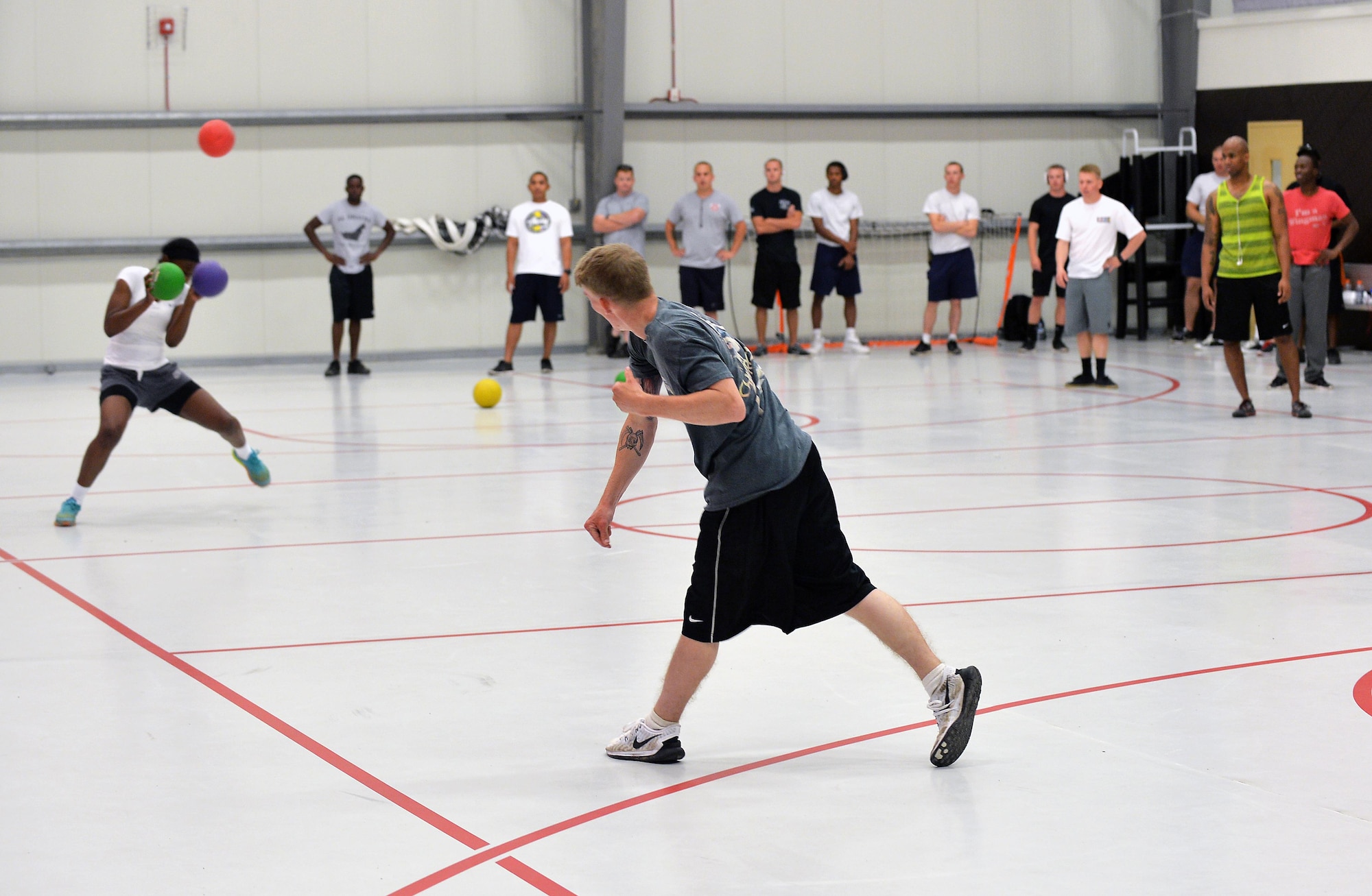 Dodgeball players go head-to-head during a tournament at an undisclosed location in Southwest Asia June 13, 2015. The teams, who were made up of U.S. Soldiers and Airmen as well as other coalition forces, participated in five sports, including this one, to help celebrate the U.S. Army’s 240th birthday. (U.S. Air Force photo/Tech. Sgt. Jeff Andrejcik)