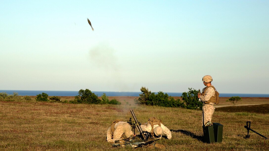 Marines with Charlie Company, 1st Battalion, 6th Marine Regiment launch 80 mm mortars in Sweden for a two-day training operation during BALTOPS 2015 June 11, 2015.  BALTOPS is an annually reoccurring multinational exercise designed to enhance flexibility and interoperability, as well as demonstrate resolve of allied and partner forces to defend the Baltic region. 