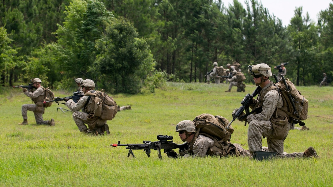Marines with 4th Platoon, Lima Company, 3rd Battalion, 8th Marine Regiment, set up perimeter security in a tactical landing zone, June 10, at Marine Corps Base Camp Lejeune, N.C., during a Tactical Recovery of Aircraft and Personnel training mission For a TRAP mission, a platoon of Marines is flown into an objective area, where they secure the area before locating a downed aircraft and its personnel to bring them back to safety.