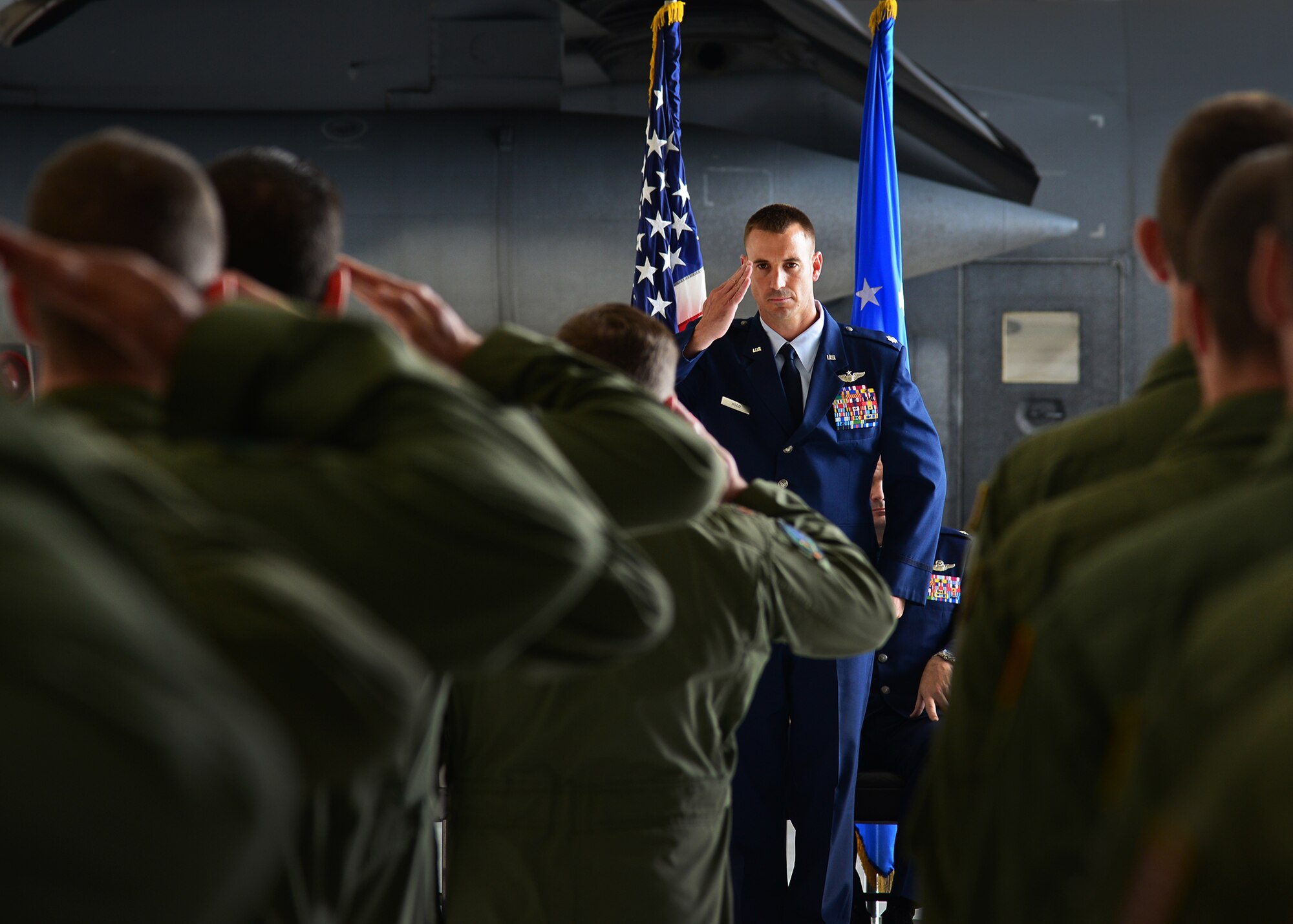 U. S. Air Force Lt. Col. Timothy Hood, 16th Special Operations Squadron commander, receives his first salute as commander during the 73rd Special Operations Squadron re-designation ceremony and 16th SOS change of command ceremony June 12, 2015 at Cannon Air Force Base, N.M. The 16th SOS absorbed aircraft and personnel from the 73rd SOS, simultaneously inheriting a long and proud heritage from the 16th SOS. (U. S. Air Force photo/Senior Airman Chip Slack)