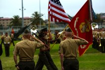 Sergeants Major David L. Jobe (left) and William T. Sowers (right) salute as the National Flag passes during a relief and appointment ceremony aboard Marine Corps Base Camp Pendleton, Calif., June 12, 2015. Sowers took charge as the senior enlisted advisor of the 1st Marine Division after completing his last assignment as the sergeant major for the Marine Corps Training and Education Command in Quantico, Va.
