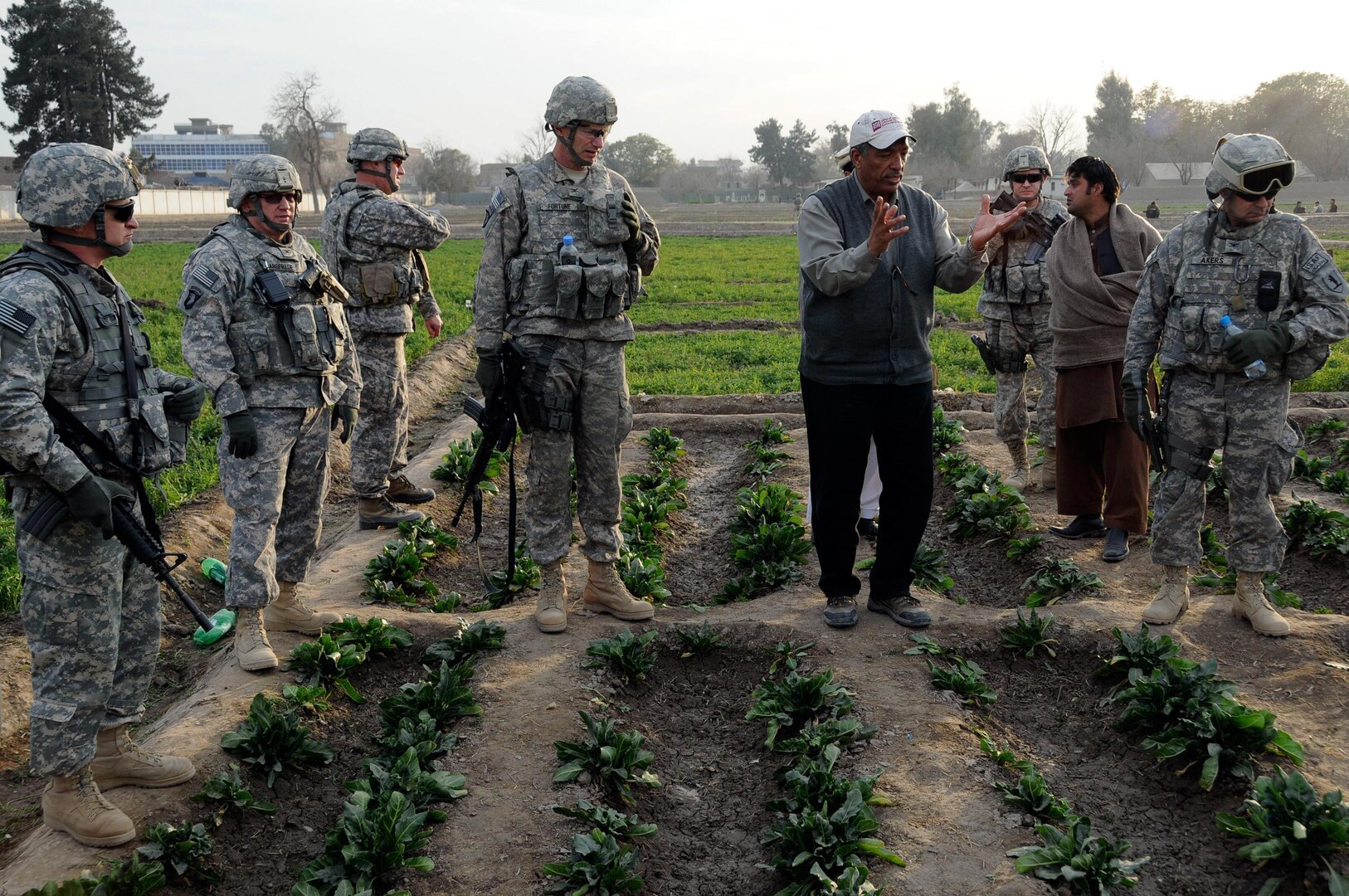 Dr. Hamdy Oushy, forage and rangeland specialist for the Afghanistan Water, Agriculture and Technology Transfer Project, gives a presentation to the commanders of the Iowa National Guard's 734th Agribusiness Development Team, the Illinois National Guard's 1-14th Agribusiness Team, Missouri ADT IV and Missouri ADT V at the Shishem Bagh Research Station Jan. 28, 2011. Leaders of the ADTs met in Jalalabad Jan. 28 for an ADT conference.
