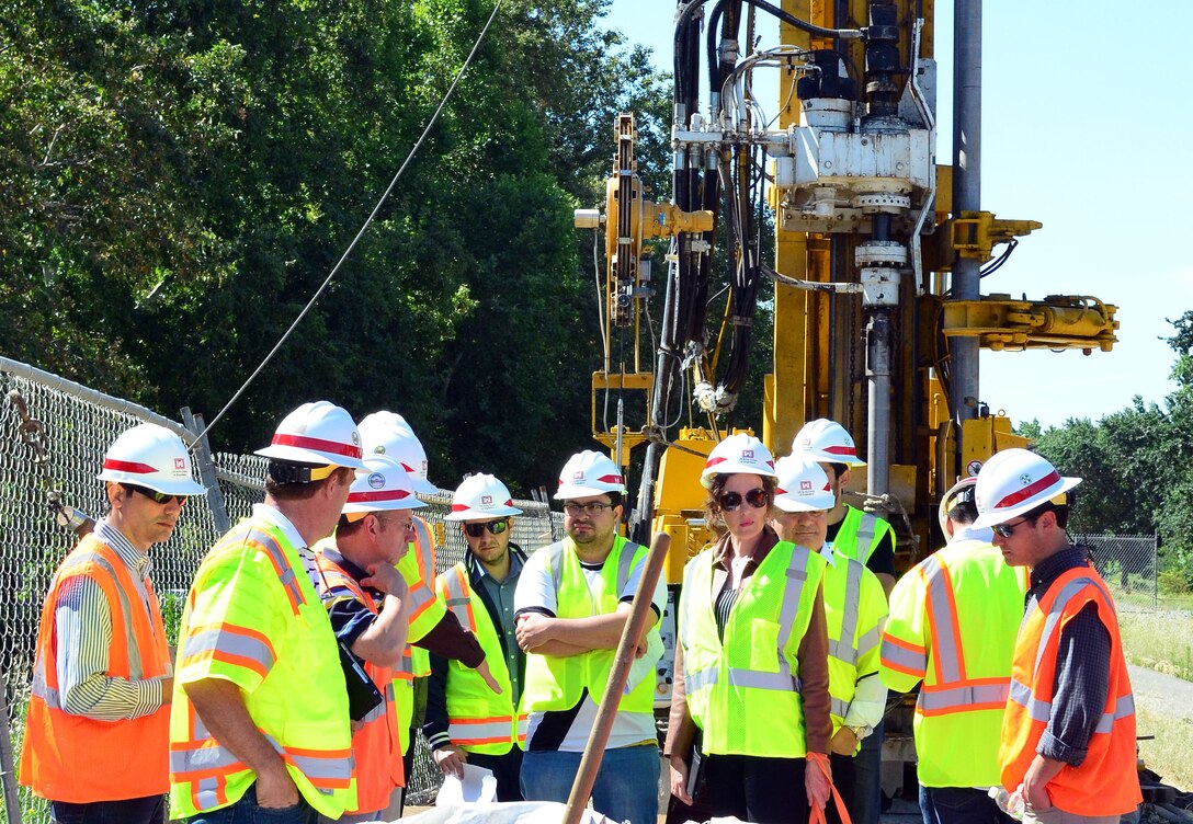 Engineers of Agência Nacional de Águas, Brazil’s primary water regulatory agency, ask questions of their U.S. Army Corps of Engineers Sacramento District hosts during a visit to a Sacramento, California, levee construction site, June 3, 2015.