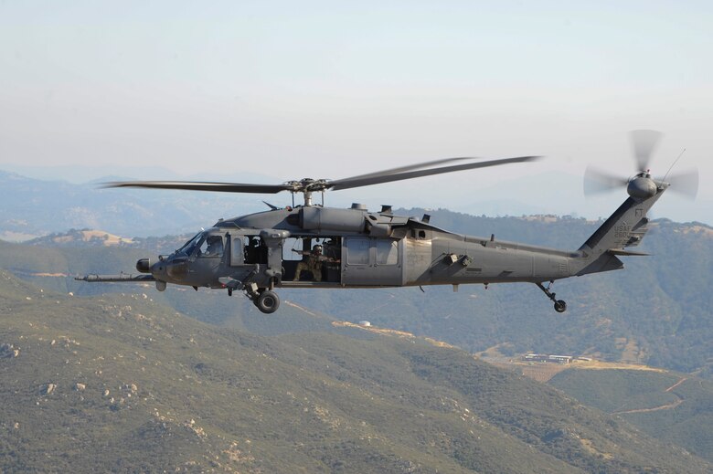 A U.S. Air Force HH-60G Pave Hawk from the 66th Rescue Squadron flies over Southern California during Angel Thunder 2015, June 11, 2015. Angel Thunder is an Air Combat Command-sponsored personnel recovery exercise for combat air force, joint, allied and interagency participants. The 66th RQS is stationed at Nellis Air Force Base, Nev. (U.S. Air Force photo by Senior Airman Betty R. Chevalier/Released)