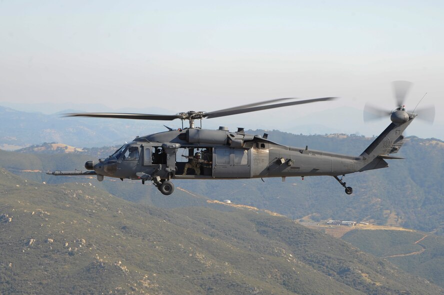 A U.S. Air Force HH-60G Pave Hawk from the 66th Rescue Squadron flies over Southern California during Angel Thunder 2015, June 11, 2015. Angel Thunder is an Air Combat Command-sponsored personnel recovery exercise for combat air force, joint, allied and interagency participants. The 66th RQS is stationed at Nellis Air Force Base, Nev. (U.S. Air Force photo by Senior Airman Betty R. Chevalier/Released)