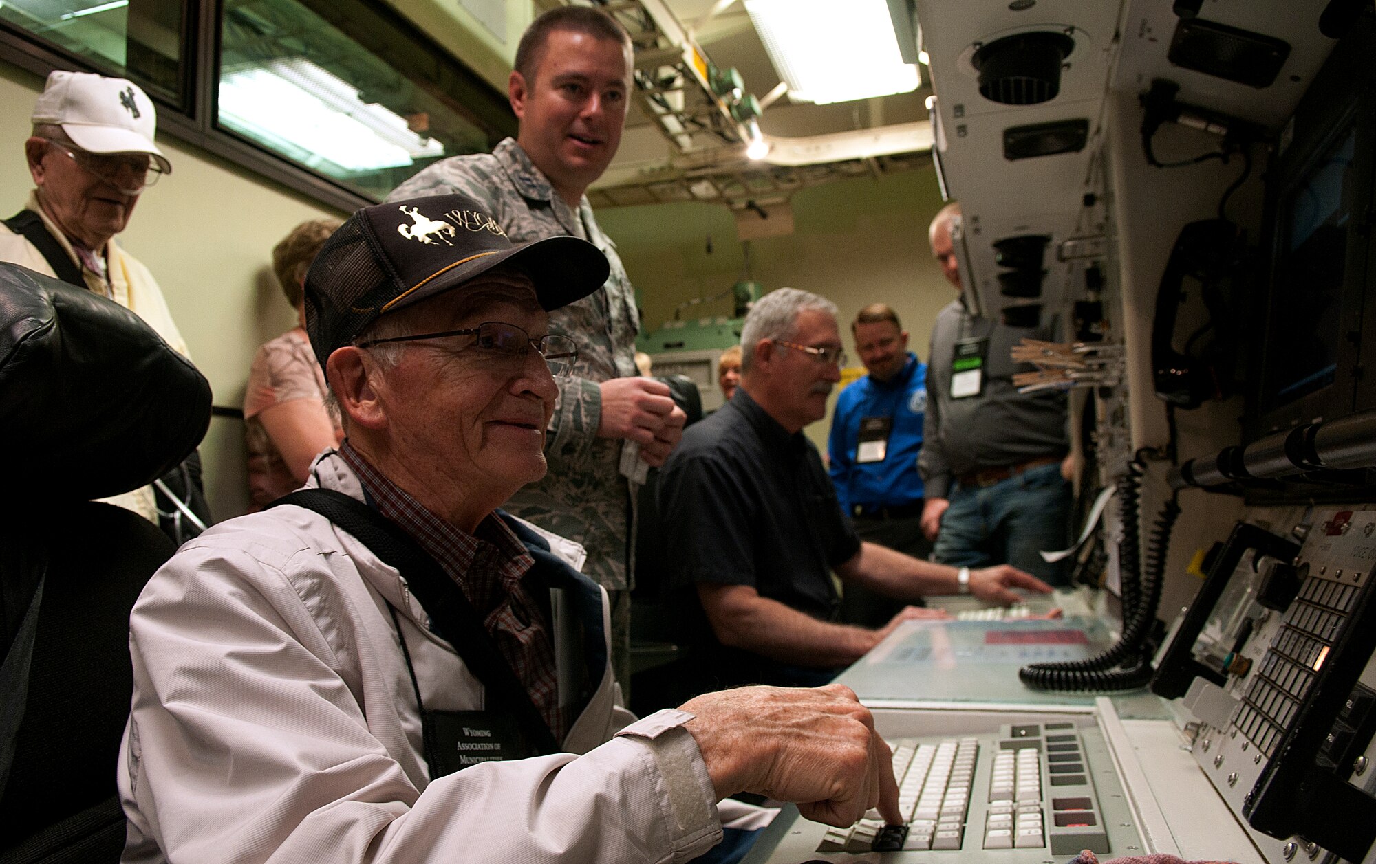 Bob Lenz, Jackson, Wyo., city council member, gets to check out the 90th Operations Group missile procedures trainer during a tour June 11, 2015, on F.E. Warren Air Force Base, Wyo. Members of the Wyoming Board of Municipalities learned about the mission of the 90th Missile Wing during a base visit. (U.S. Air Force photo by Airman 1st Class Brandon Valle)
