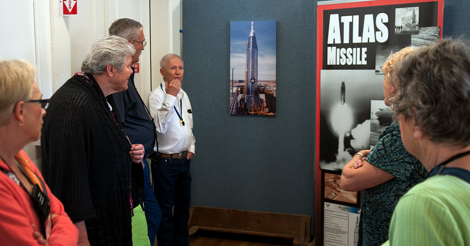 Ted Meeker, 90th Missile Wing ICBM and Heritage Museum volunteer, talks to members from the Wyoming Board of Municipalities about his past experiences as a missile maintainer during a tour of the museum June 11, 2015, on F.E. Warren Air Force Base, Wyo. Members learned about a number of historical artifacts from the base, including pieces of the Peacekeeper and older computer systems used in the old missile sites. (U.S. Air Force photo by Airman 1st Class Brandon Valle)