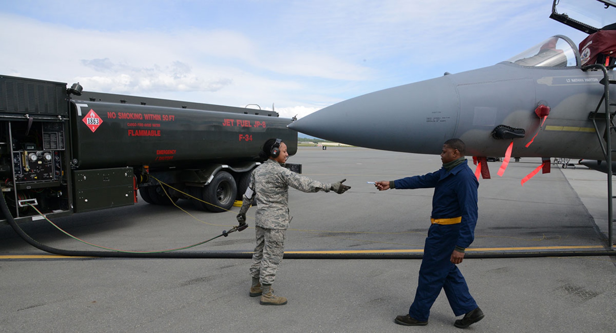 Airman 1st Class Deniqwia Brooks, 673d Logistics Readiness Squadron fuels specialist, prepares to fuel an F-15C Eagle on the Joint Base Elmendorf-Richardson flightline June 8. The Fuels Management Flight was recently recognized as the best in the Air Force, due to stellar performance despite the difficulties of the JBER mission. The flight operates out of three geographically distant areas, on an installation larger than all other Pacific Air Forces bases combine. They provide fuel not only for integral JBER units, but visiting aircraft on a multitude of exercises as well as other U.S. government aircraft. (U.S. Air Force photo/Staff Sgt. Wes Wright)