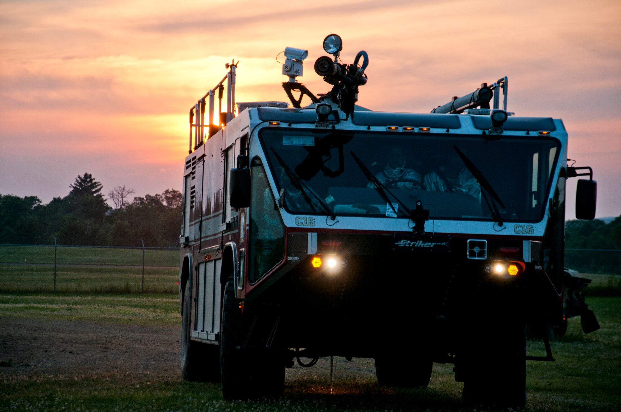 Members of the 446th Civil Engineer Squadron Fire Protection Flight head out train on putting out a JP8 jet fuel fire at Fort McCoy WI. during Patriot Warrior, June 10th, 2015. Patriot Warrior is an Air Force Reserve Command exercise performed in a joint environment with U.S. Army and Navy Reserves, active duty and Air National Guard partners designed to evaluate the capability to deploy, establish and operate in support of joint operations. Nearly 6,000 U.S. Army Reserve, Navy Reserve and AFRC personnel took part in the exercise. The 446th Fire Protection Flight had a unique opportunity to train with JP8 jet fuel during the exercise, which simulates the conditions of real fires they might encounter much more closely than propane. (U.S. Air Force photo by Senior Airman Daniel Liddicoet/Released)