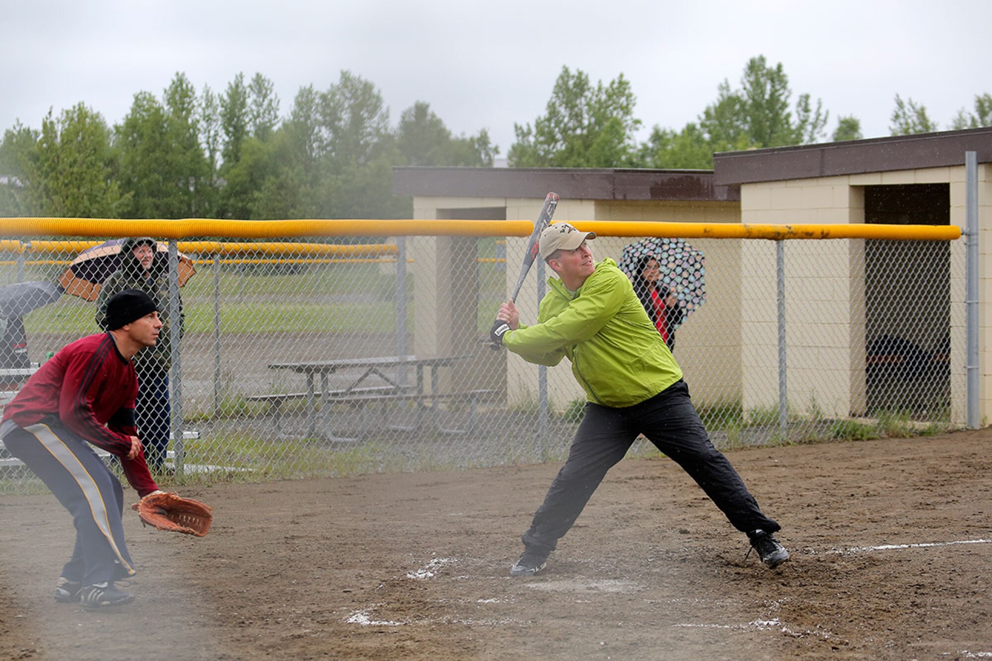 Air Force Col. Brian R. Bruckbauer, the commander of Joint Base Elmendorf-Richard and 673d Air Base Wing, competes in a softball game between the base colonels and chief master sergeants on JBER June 5. The chief master sergeants beat the colonels 6-2. (U.S. Air Force phtoto/Alejandro Pena) 