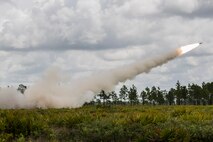 The 3-27th Field Artillery Regiment launches an M142 High Mobility Artillery Rocket System (HIMARS) rocket during Exercise DRAGON STRIKE June 10, 2015, at Avon Park Air Force Range, Fla. The 3-27th FAR worked alongside the 18th Air Support Operations Group, 820th Base Defense Group, 23d Maintenance Group and 23d Fighter Group. (U.S. Air Force photo by Airman 1st Class Dillian Bamman/Released)