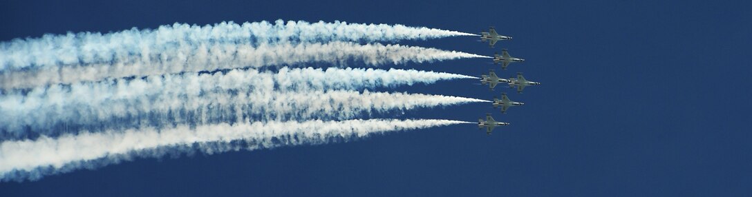 The U.S. Air Force Thunderbirds perform aerial demonstrations in F-16
Fighting Falcons June 14, 2015, during the Wings Over Whiteman air show at
Whiteman Air Force Base, Mo. The entire show runs approximately an hour and
15 minutes and includes roughly 30 maneuvers. (U.S. Air Force photo by Senior Airman Joel Pfiester/Released)
