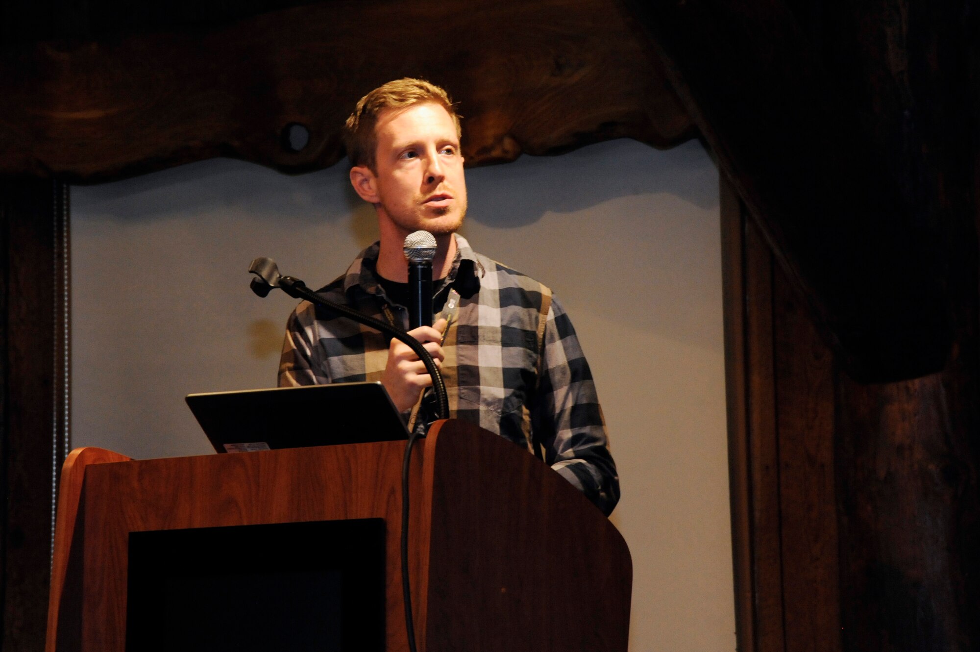 Mr. James Owens, the Yellow Ribbon Reintegration Program (YRRP) coordinator, discusses various aspects of the weekend program to members of the Oregon Air National Guard preparing for deployment, May 30, 2015, Bend, Ore. (U.S. Air National Guard photo by Tech. Sgt. John Hughel, 142nd Fighter Wing Public Affairs /Released)