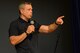 Comedian Bernie McGrenahan performs, “Comedy with a Message,” June 12, 2015, at Beale Air Force Base, California. McGrenahan began his comedy tour in 1995 to promote resiliency, safety, bystander intervention and respect. He also shares his experiences overcoming addiction. (U.S. Air Force photo by Airman 1st Class Ramon A. Adelan/Released) 
