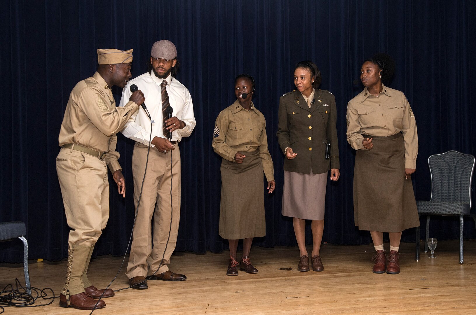 Members of the Lackland Performing Arts Group perform during the Tuskegee Airmen Tribute, June 12, 2015, at Joint Base San Antonio-Randolph’s Parr Club.  Members of the JBSA-Randolph community celebrated the legacy of the first all-black unit by paying tribute to seven of the documented original Tuskegee Airmen members.  The Tuskegee Airmen distinguished themselves during World War II with more than 15,500 sorties and 1,500 missions in Europe and North Africa and earned numerous combat awards.  The event featured musical entertainment, comments by 12th Flying Training Wing leaders, an introduction of four Tuskegee Airmen present and a presentation of gifts to them. Members of the audience had an opportunity to mingle with the Tuskegee Airmen and listen to their stories. (U.S. Air Force photo by Johnny Saldivar/released)