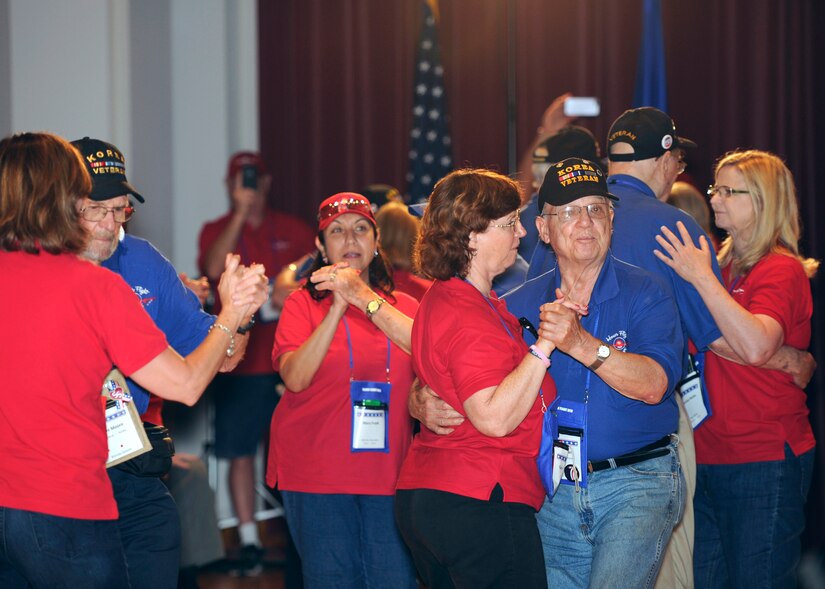 Korean War veterans dance with volunteers during an Airmen of Note concert June 13, 2015, at Joint Base Anacostia-Bolling, D.C. Veterans were encouraged to dance to their favorite songs throughout the concert. (U.S. Air Force photo by Senior Airman Preston Webb/Released)
