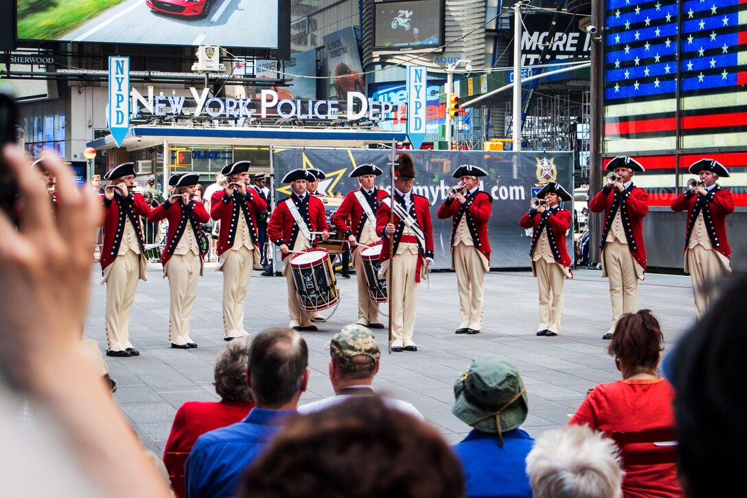 The U.S. Army Old Guard's Fife and Drum Corps performs during a celebration of the Army's 240th birthday in Times Square in New York, June 12, 2015.