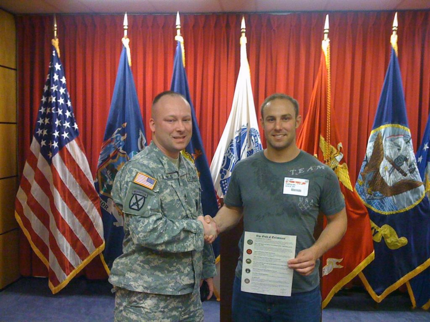 Staff Sgt. James Bills enlists Bobsledder Nick Cunningham.